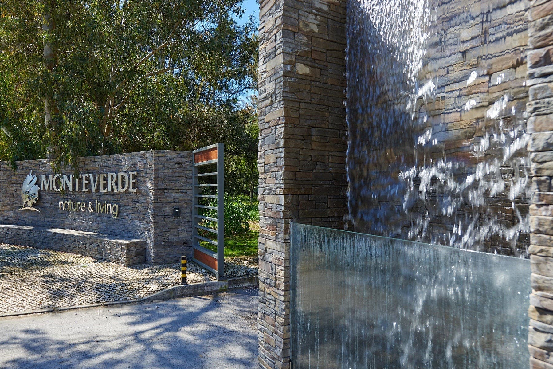 Stone entrance sign and water feature at Herdade Monteverde.